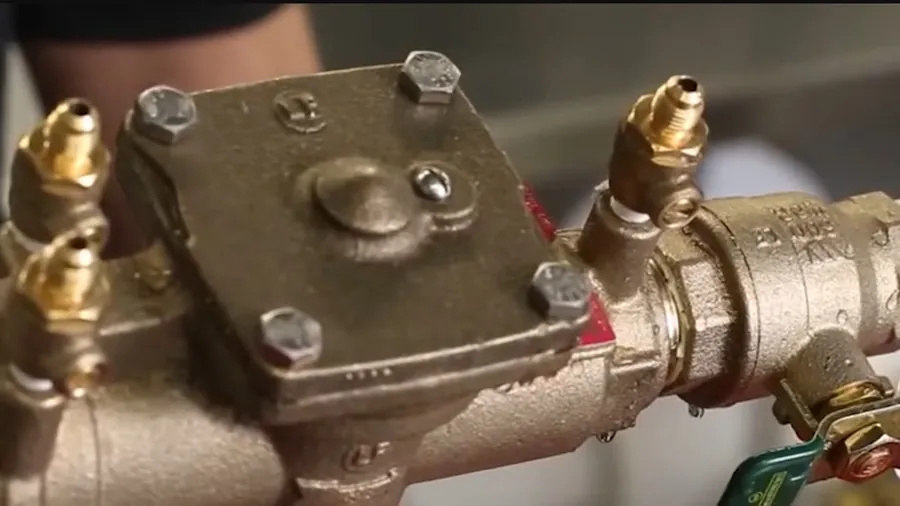 Close-up of backflow preventer valves and fittings for Backflow Testing & Prevention in Lakewood, CA