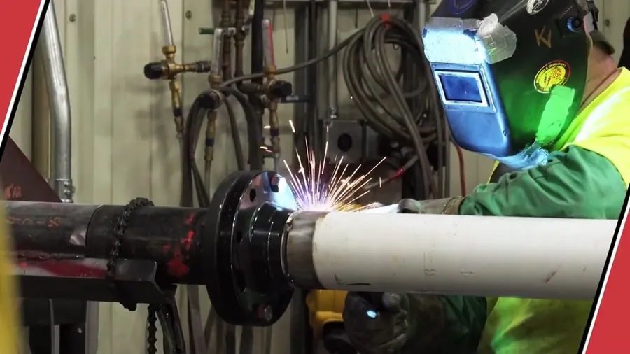 Commercial pipe coupling being tightened on a drain line for Plumber in Long Beach, CA