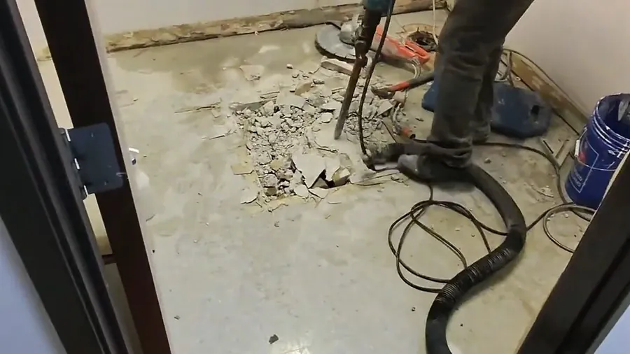 Drain cable machine positioned at a floor cleanout for Plumbing Service in the Del Amo Boulevard Corridor, Lakewood CA