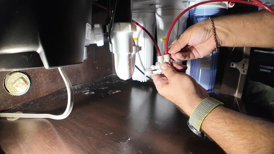 Electric wiring connection beneath a garbage disposal for Garbage Disposal Repair & Installation in Lakewood, CA