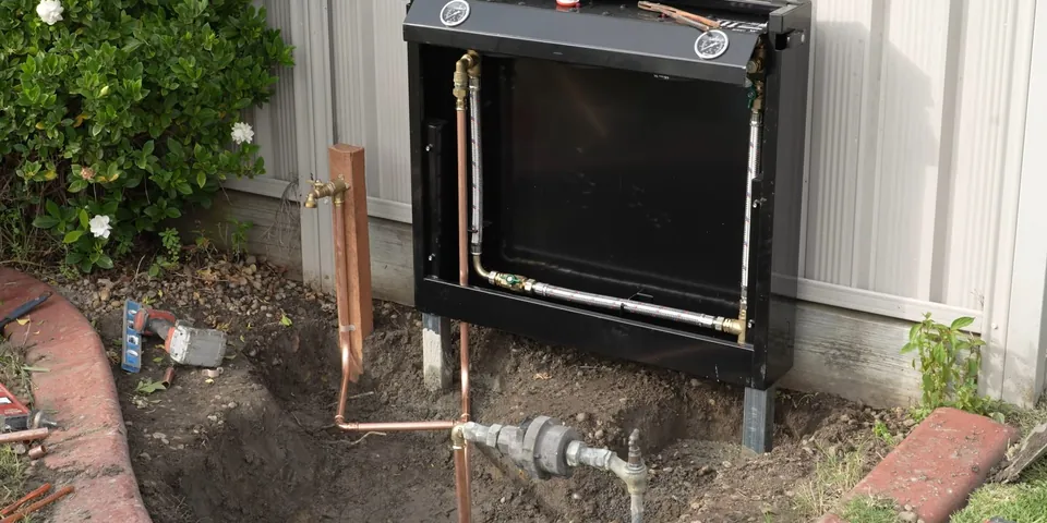 Outdoor filtration cabinet installed near landscaping for Plumbing Service in the Lakewood Mall Area, Lakewood CA