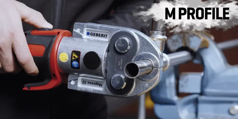 Press tool clamping a new pipe fitting for Repiping & Whole-Home Pipe Replacement in Lakewood, CA