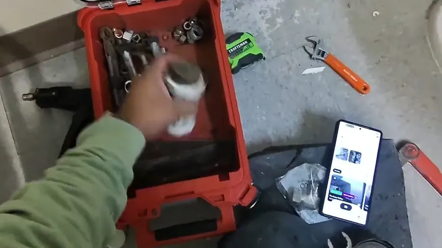 Technician using a sewer camera monitor near a cleanout for Annual Plumbing Checklist for Lakewood Homeowners