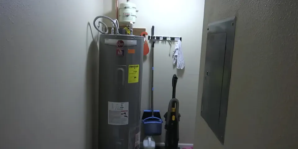 Water heater standing inside a utility closet for Plumber in Long Beach, CA